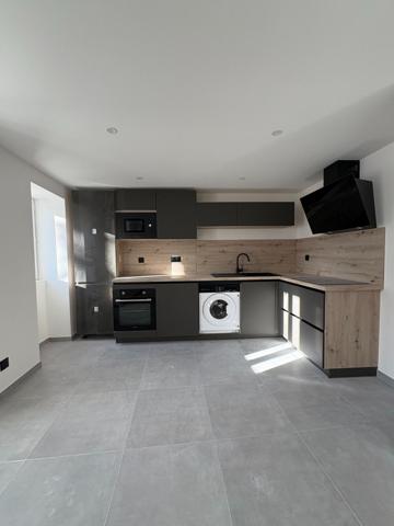 APPARTEMENT NEUF AU REZ-DE-CHAUSSEE