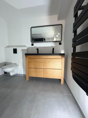 APPARTEMENT NEUF AU REZ-DE-CHAUSSEE