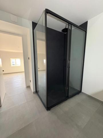 APPARTEMENT NEUF AU REZ-DE-CHAUSSEE