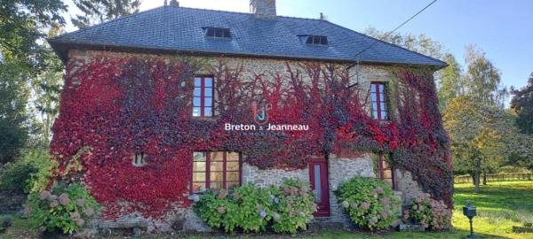 Propriété avec plan d'eau proche de Villaines la Juhel