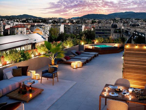 Écrin Contemporain et Rooftops au Cœur de la Libération