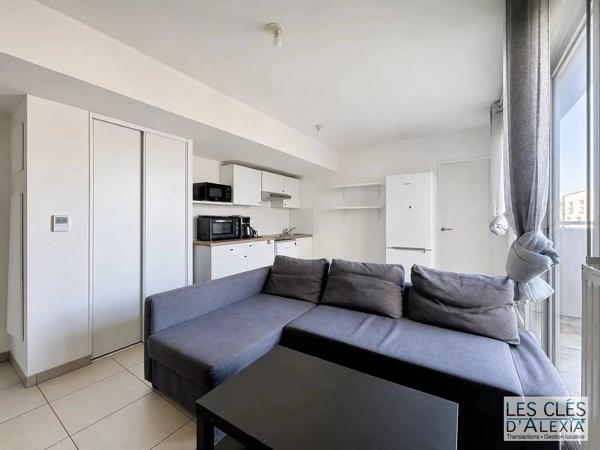 Lyon 7 - T2  de 42 m² avec balcon et garage