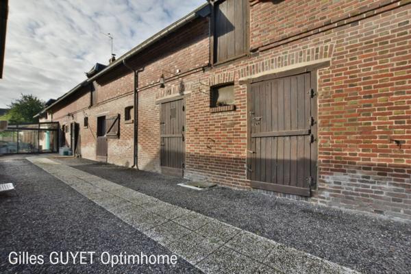 10MN de BERNAY T7 151M² 185000€ avec garage et terrain de 500M² ( Bourg avec commerces)