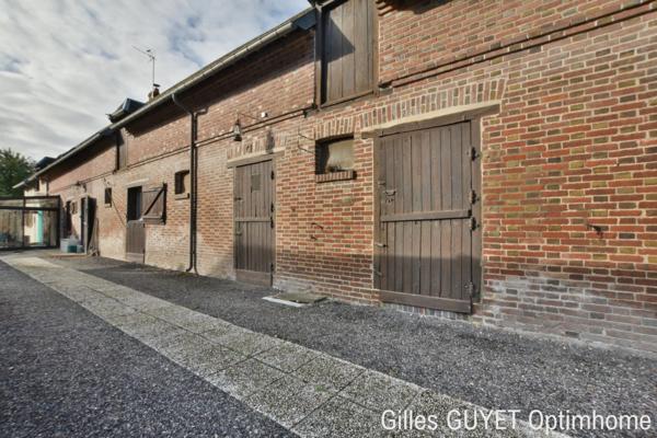 10MN de BERNAY T7 151M² 185000€ avec garage et terrain de 500M² ( Bourg avec commerces)