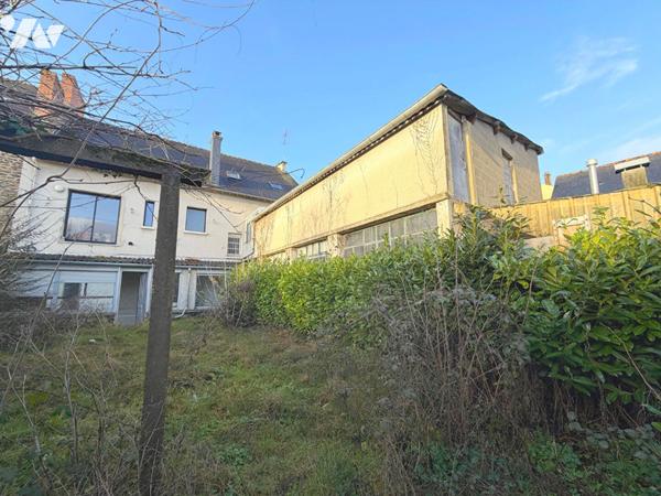 IMMEUBLE RUE DE VERN AVEC JARDIN !