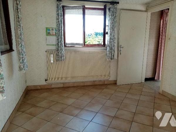 secteur calme et ensoleillé, pavillon individuel élevé sur sous-sol avec terrain attenant de 1290 m²