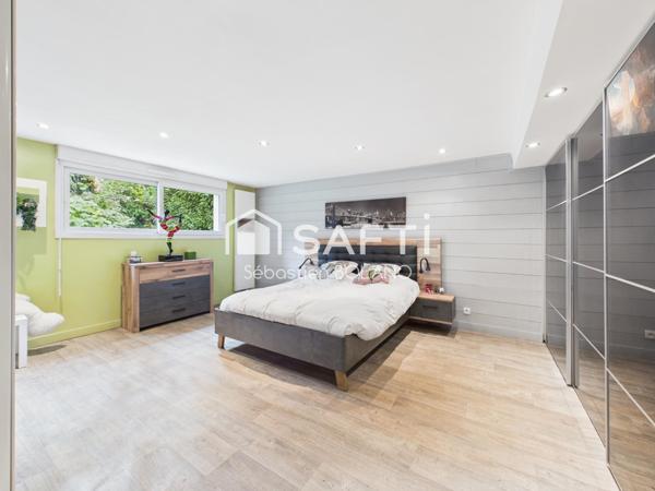 Maison familiale 208 m², sous-sol aménagé, jardin arboré et prestations rares à Viry-Châtillon.