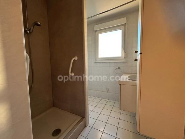 VILLAGE-NEUF, quartier résidentiel en impasse, joli appartement 2pièces de 51.60m², balcon, cave. Top emplacement!