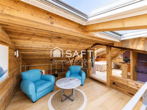 Chalet d'exception, refait à neuf 4 pièces, 3 chambres, garage, parking et terrain privatif.