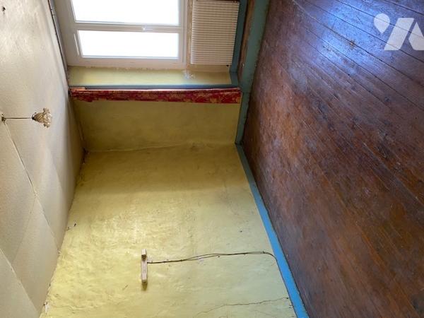 Un immeuble entier à usage mixte d'habitation et commercial