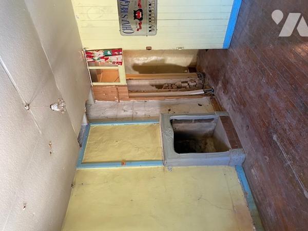 Un immeuble entier à usage mixte d'habitation et commercial