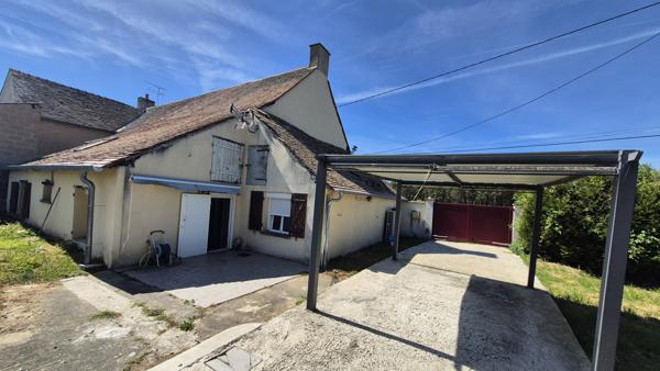 Maison à rafraichir avec beau potentiel