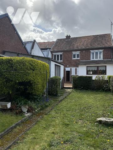 Maison de ville avec garage et jardin