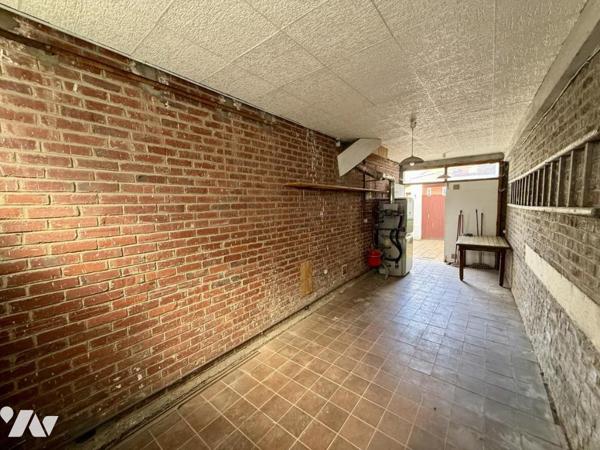 Maison de ville avec garage et jardin