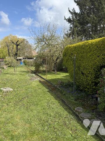 Maison de ville avec garage et jardin