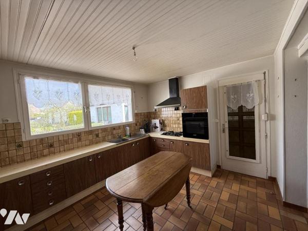 Maison de ville avec garage et jardin