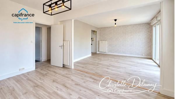 À VENDRE – BEL APPARTEMENT DE 65 M² AVEC BALCON, PARKING ET CAVE À LAVAL