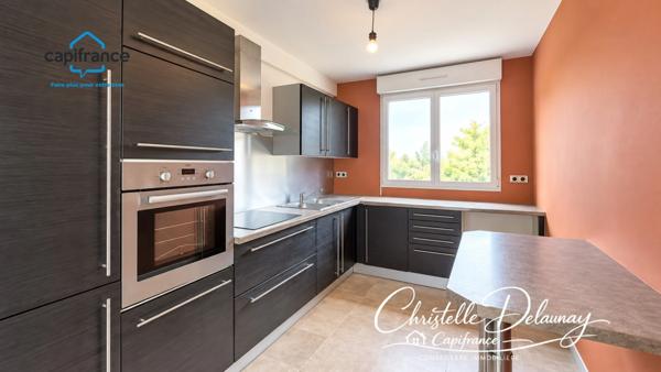 À VENDRE – BEL APPARTEMENT DE 65 M² AVEC BALCON, PARKING ET CAVE À LAVAL