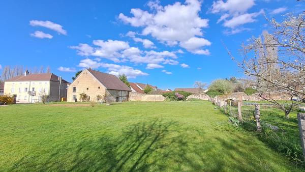 District belle situation pour ce terrain plat constructible viabilisé !