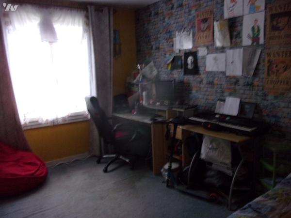 Appartement au 2ème étage entrée cuisine salon-séjour 4 chambres salle d'eau dressing garage cave