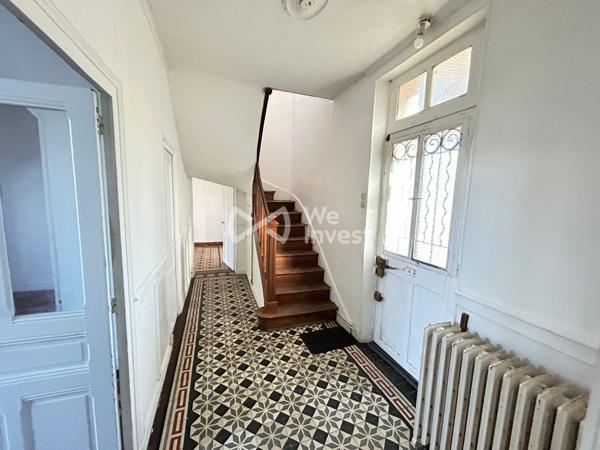 À proximité du centre de Villemandeur – Ensemble immobilier avec fort potentiel