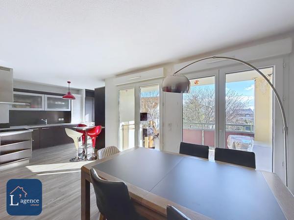 Appartement T4 traversant avec balcon et garage en plein centre de Sergy 01630