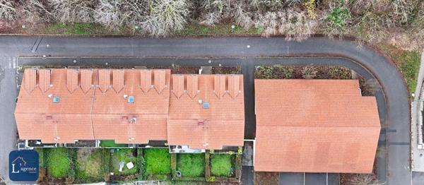 Appartement T4 traversant avec balcon et garage en plein centre de Sergy 01630