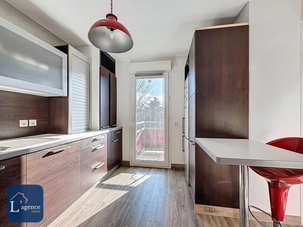 Appartement T4 traversant avec balcon et garage en plein centre de Sergy 01630