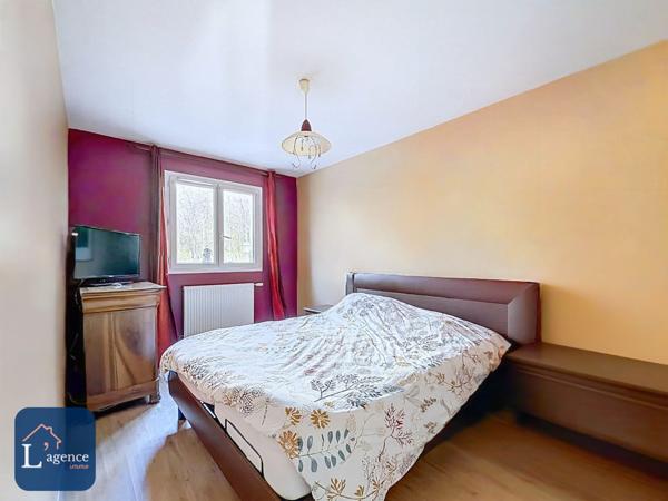 Appartement T4 traversant avec balcon et garage en plein centre de Sergy 01630