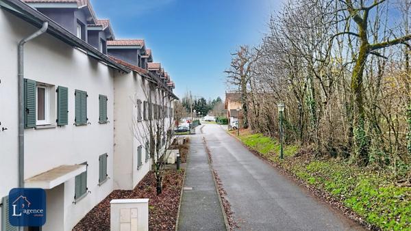 Appartement T4 traversant avec balcon et garage en plein centre de Sergy 01630