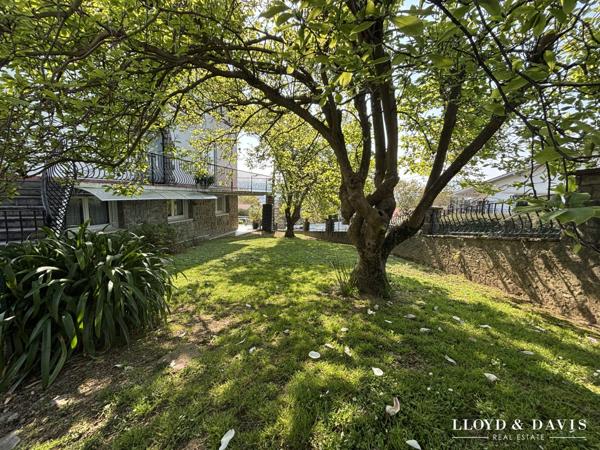 APPARTEMENT AVEC GARAGE ET GRAND JARDIN