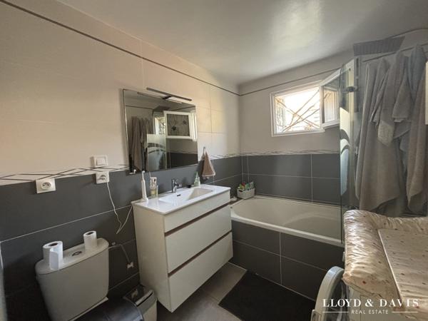 APPARTEMENT AVEC GARAGE ET GRAND JARDIN