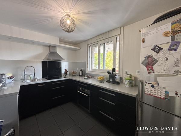 APPARTEMENT AVEC GARAGE ET GRAND JARDIN