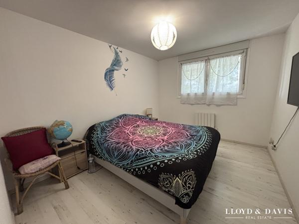 APPARTEMENT AVEC GARAGE ET GRAND JARDIN