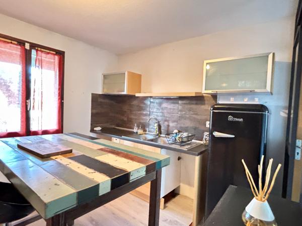 Maison plain-pied avec garage et jardin