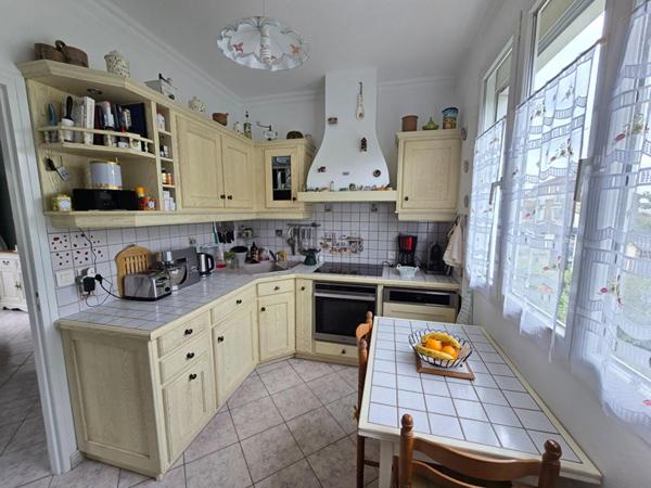 Maison individuelle avec 4 chambres, véranda et magnifique jardin