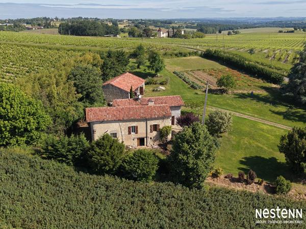 A Vendre ancien corps de  ferme avec dépendances et 2 hectares de terrain à 2 km de Condom