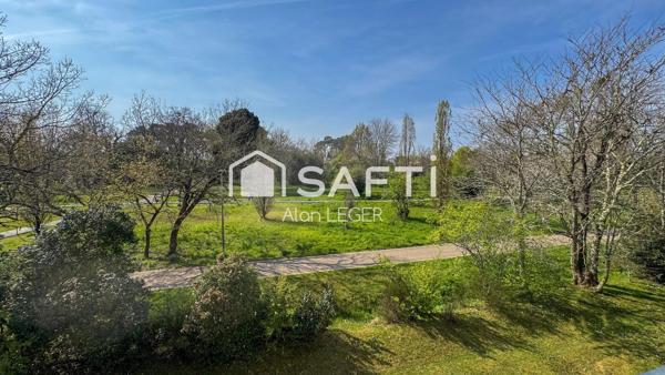 Super appartement traversant et verdoyant