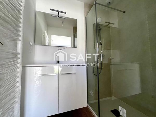 Appartement 1 chambre, balcon, stationnement fermé.