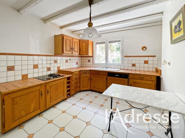 Maison mitoyenne Type 4 avec garage attenant et dépendance sur jardin