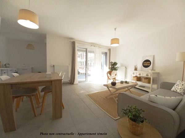 T4 de 83.7 M² avec terrasse et parking