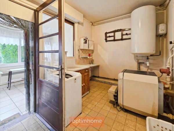MAISON INDIVIDUELLE – 3 CHAMBRES – JARDIN – GARAGE + 5 GARAGES LOUÉS