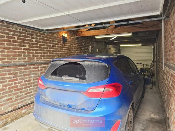 MAISON INDIVIDUELLE – 3 CHAMBRES – JARDIN – GARAGE + 5 GARAGES LOUÉS