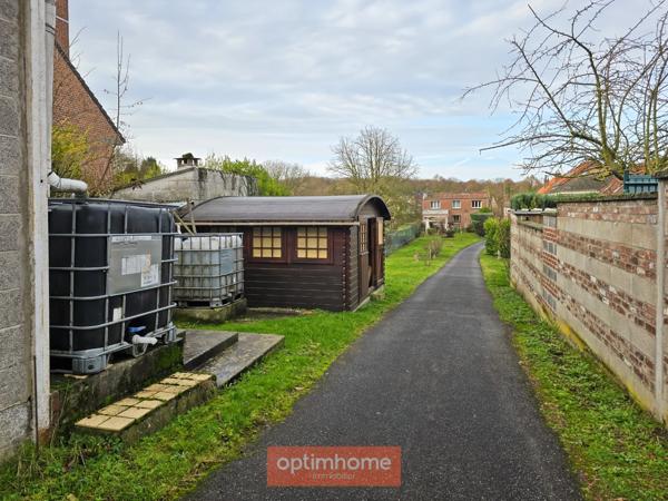 MAISON INDIVIDUELLE – 3 CHAMBRES – JARDIN – GARAGE + 5 GARAGES LOUÉS