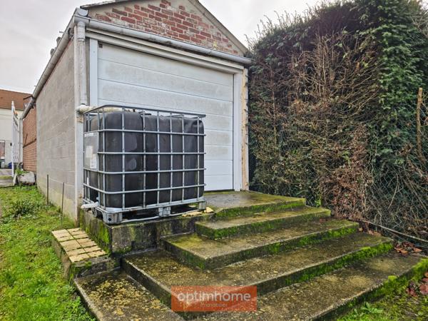 MAISON INDIVIDUELLE – 3 CHAMBRES – JARDIN – GARAGE + 5 GARAGES LOUÉS