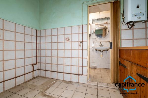 Maison de 165 m2 constituée par 4 appartements sur un terrain de 502 m2 en pleine propriete secteur recherché