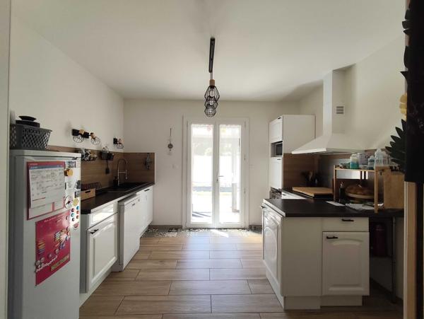 MAISON DE PLAIN PIED AVEC JARDIN