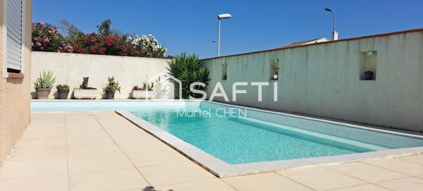 AUBORD : villa avec garage, jardin et piscine