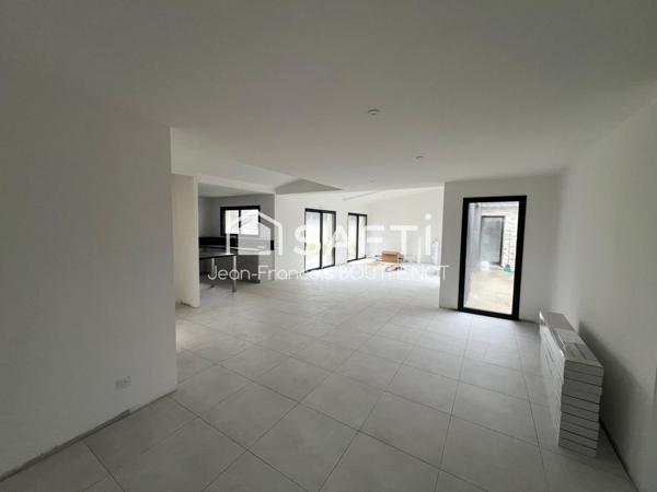 Maison de plain-pied de 155 m² avec patio