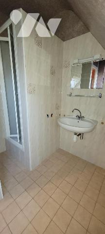 MAISON DANS LE BOURG DE GUIDEL